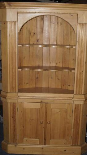 A pine corner cabinet