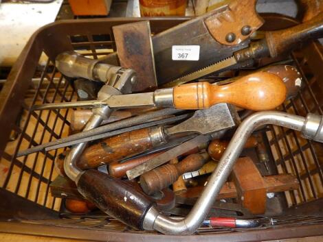 A collection of woodworking hand tools.