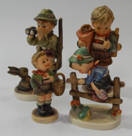 Four Goebel Hummel figures.