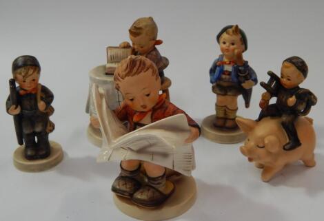 Five Goebel Hummel figures.