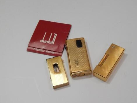A Dunhill rolled gold cigarette lighter