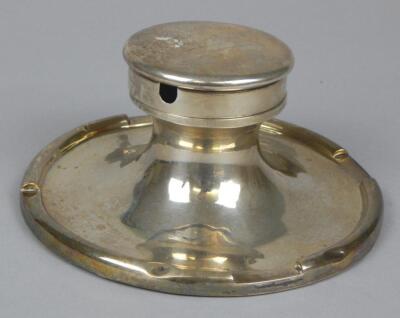 An Edwardian Asprey silver capstan type inkwell