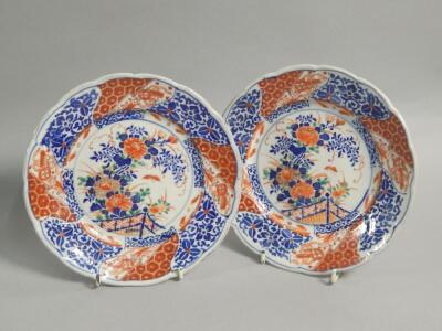 A pair of early 20thC Japanese Imari plates