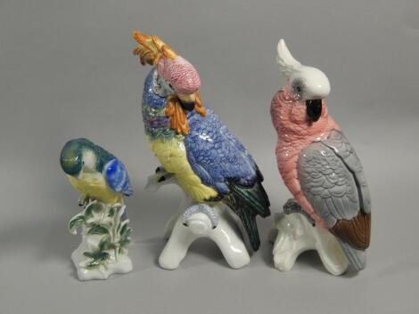 Three Continental ceramic parrots