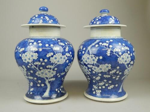 A pair of Chinese porcelain vases and covers