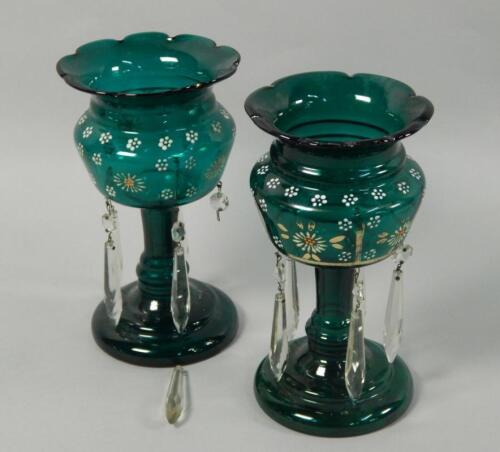 A pair of small Victorian green glass lustres