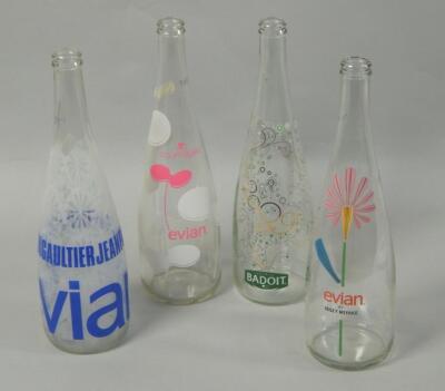 Four designer mineral water bottles