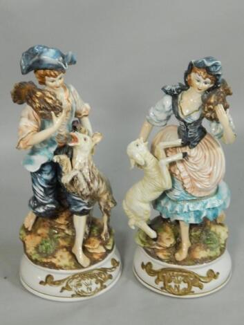 A large pair of Capo di Monte pottery figures