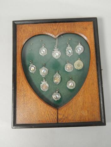 A collection of silver and enamel pigeon racing prize medallions or fobs etc