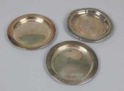 Three small silver dishes