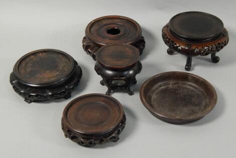 Various early 20thC and later Chinese hardwood vase or urn stands