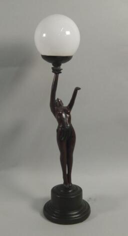 A modern bronzed resin Art Deco style lamp base