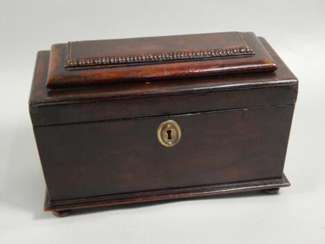 An early Victorian mahogany tea caddy