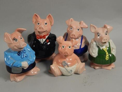 A set of five Wade piggy banks