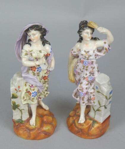 A pair of Sitzendorf porcelain figures