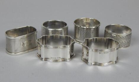 Six various silver napkin rings