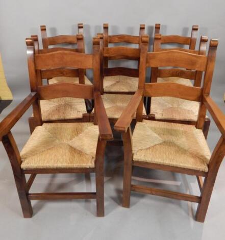 A set of eight modern stained beech dining chairs