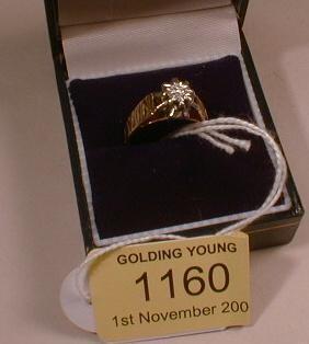 An 18ct gold diamond set ring