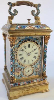 A late 19thC French gilt brass and champleve enamel striking and repeating carriage clock