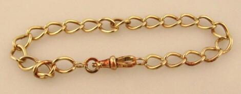 A yellow metal heavy link bracelet