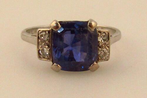 A ladies claw set sapphire ring