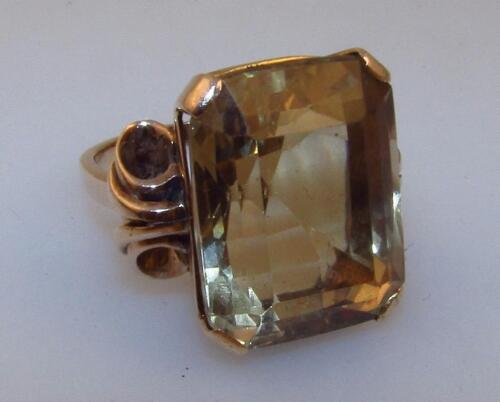 A ladies heavy claw set citrine ring