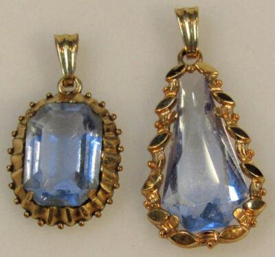 Two similar pendants