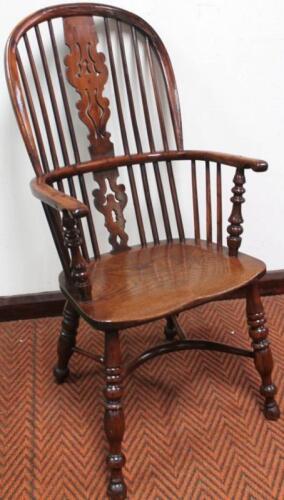 A good 19thC yew wood and elm high back Windsor chair