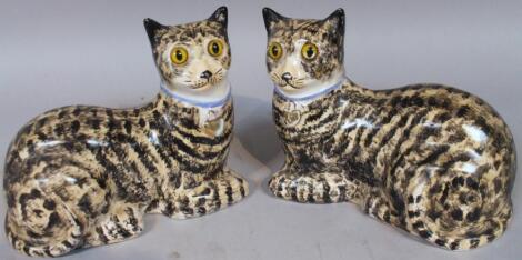 A pair of earthenware cats