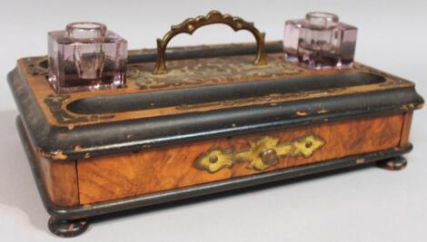 A late 19thC walnut ebonised and gilt metal inkstand