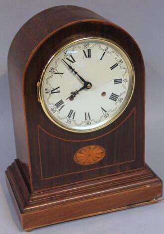 An Edwardian mahogany and boxwood strung domed top mantel clock