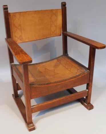 An early 20thC oak occasional chair