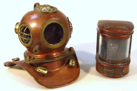 A miniature 20thC brass and copper diver's helmet