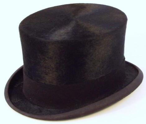 An early 20thC child's silk dressage top hat