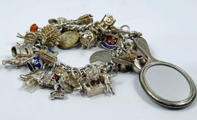 A mid 20thC charm bracelet