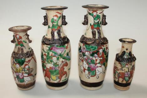 A pair of Cantonese earthenware vases