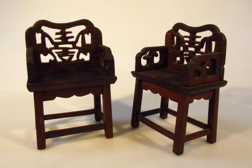 A pair of Chinese Qing period huanghuali miniature chairs