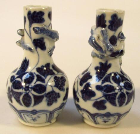 A pair of miniature Japanese porcelain vases