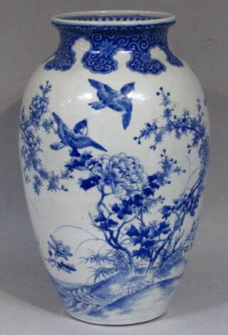 A 19thC Japanese Meiji period blue and white earthenware vase