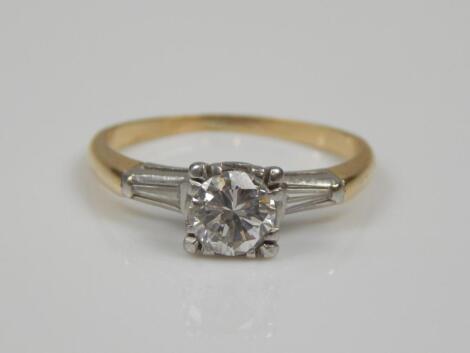 A diamond solitaire ring