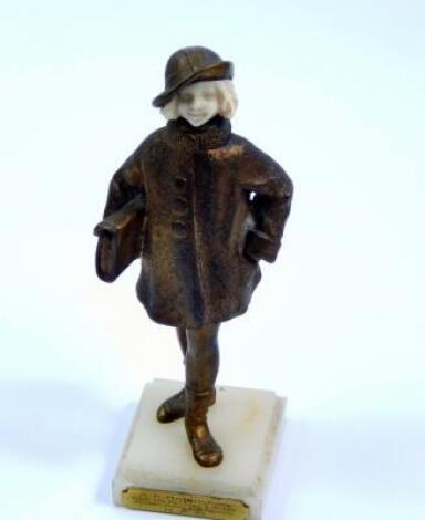 An early 20thC gilt bronze figure of a young girl