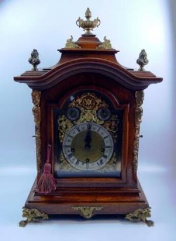 A late 19thC/early 20thC oak mantel clock