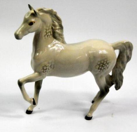 A Beswick ceramic model of a dapple grey horse