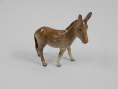 A Beswick model of a donkey foal