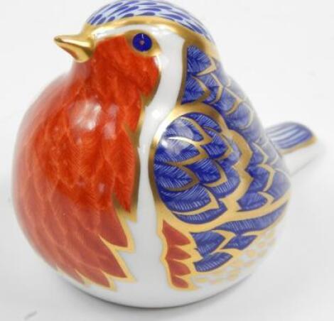 A Royal Crown Derby porcelain paperweight