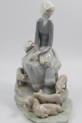 A Lladro porcelain figure group