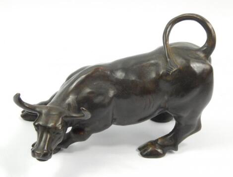 A modern bronze figure of a bull