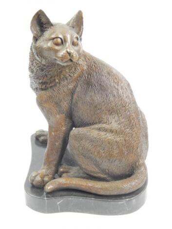 A modern bronze figure of a cat