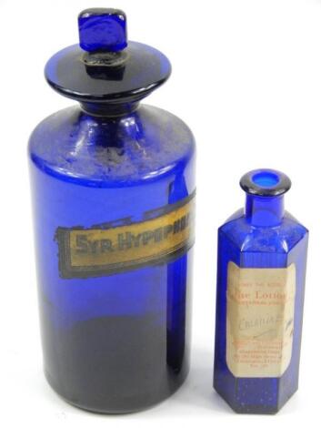 An early 20thC blue glass medicine bottle