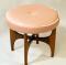 A 1960's teak dressing stool